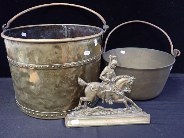 A RIVETTED BRASS LOG BUCKET