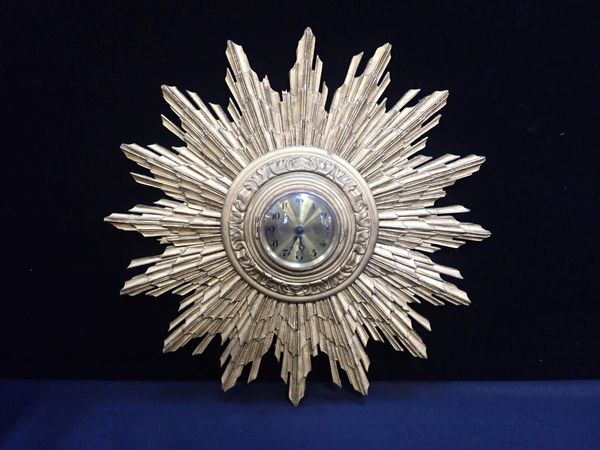 A 1930s GILT SUNBURST CLOCK