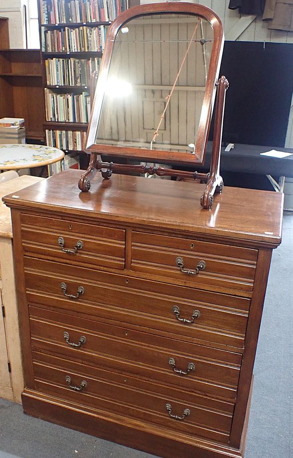 A LATE VICTORIAN WALNUT CHEST OF DRAWERS