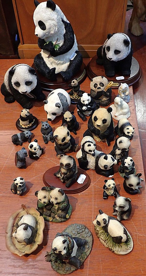 A LARGE QUANITITY OF RESIN CAST PANDA FIGURES