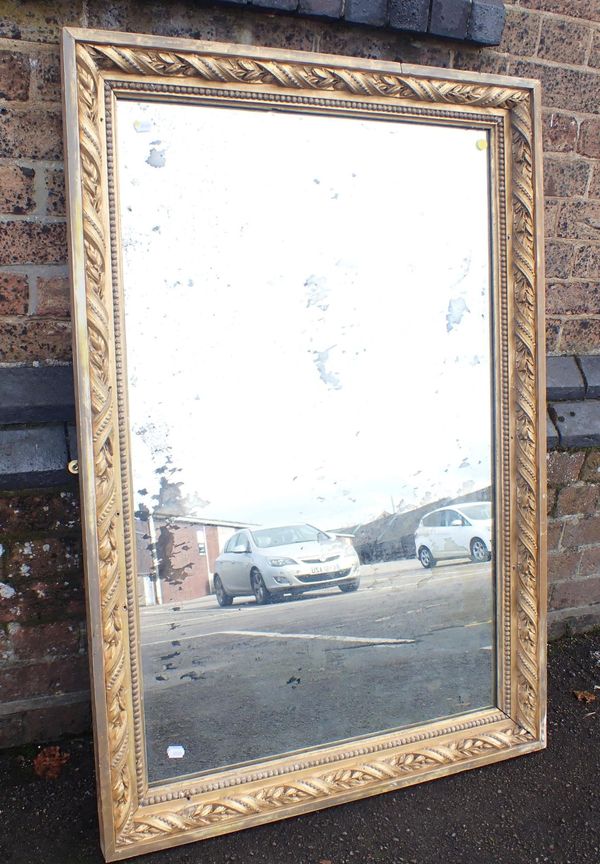 A 19th CENTURY GILT FRAMED MIRROR