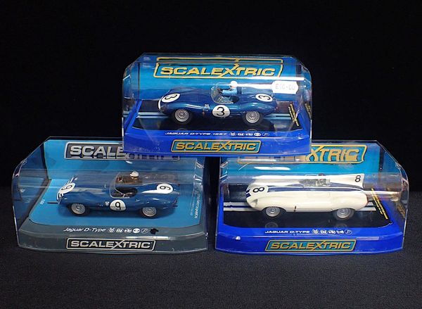 THREE BOXED SCALEXTRIC 'JAGUAR D-TYPE' CARS