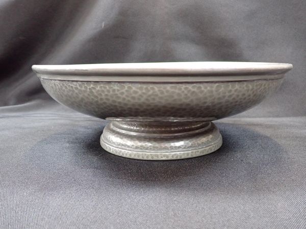 A TUDRIC PEWTER FOOTED BOWL