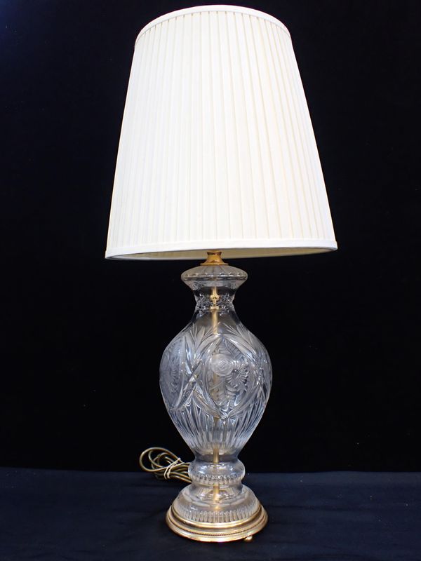 A MOULDED AND CUT GLASS TABLE LAMP