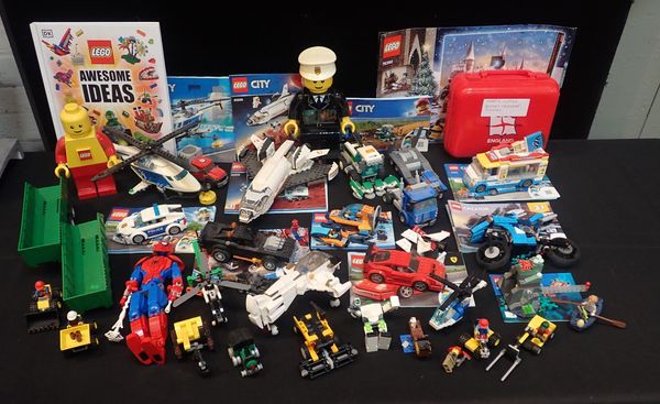 A COLLECTION OF UNBOXED LEGO CITY MODELS