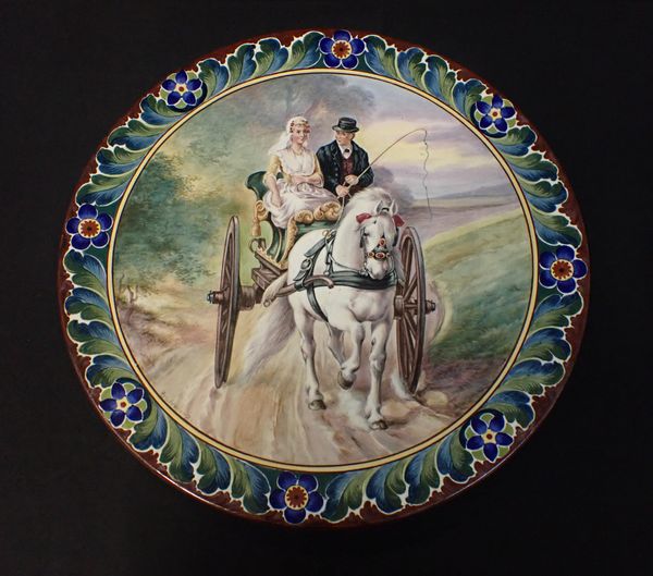 A GERMAN POTTERY CHARGER BY FRANZ ANTON MEHLEM, BONN