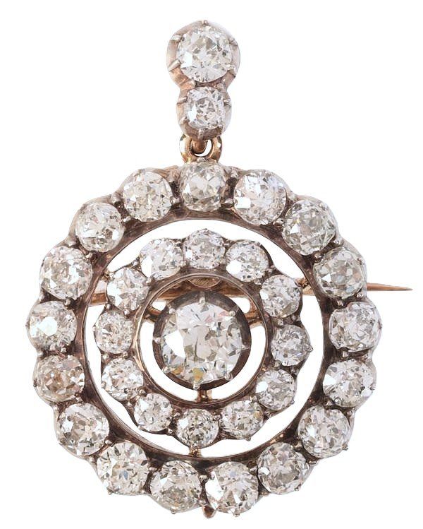 AN ANTIQUE VICTORIAN DIAMOND CLUSTER PENDANT / BROOCH