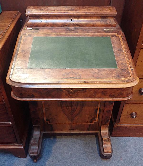 A VICTORIAN WALNUT DAVENPORT