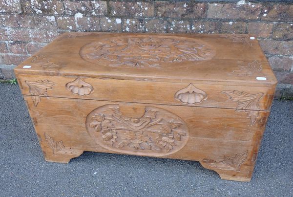A CHINESE CARVED HARDWOOD CHEST