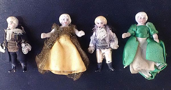 FOUR 19th CENTURY PORCELAIN BISQUE MINIATURE DOLLS