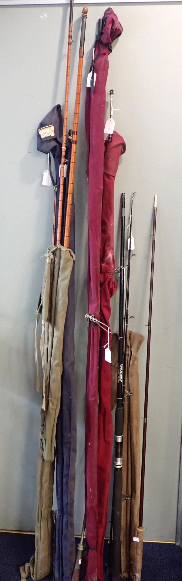 A COLLECTION OF FISHING RODS