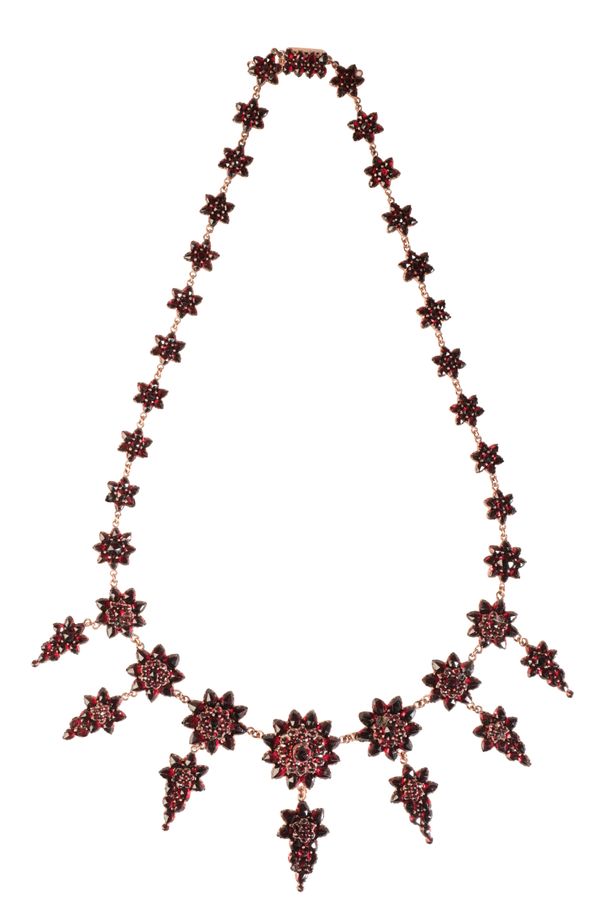 AN ANTIQUE GARNET FRINGE NECKLACE