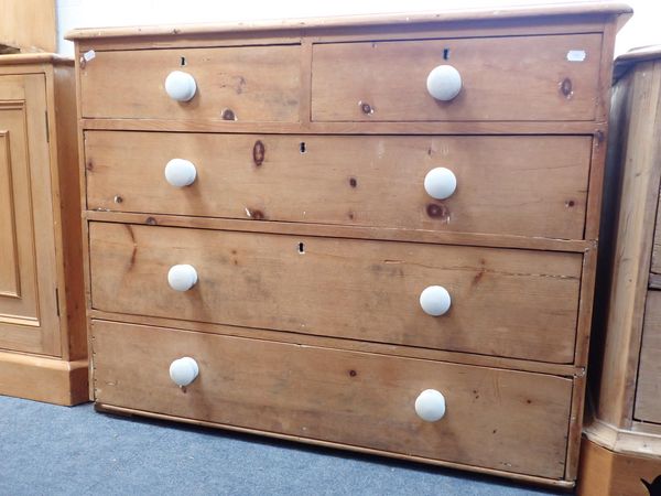 A VICTORIAN STRIPPED PINE CHEST OF DRAWERS