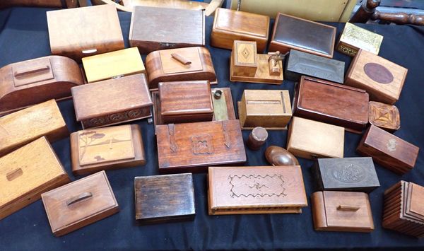 A COLLECTION OF WOODEN CIGARETTE BOXES