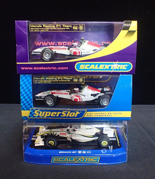 THREE BOXED SCALEXTRIC F1 CARS