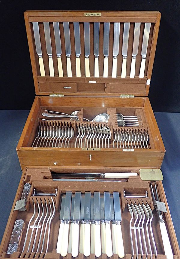 AN OAK-CASED MAPPIN & WEBB SILVER-PLATED CANTEEN