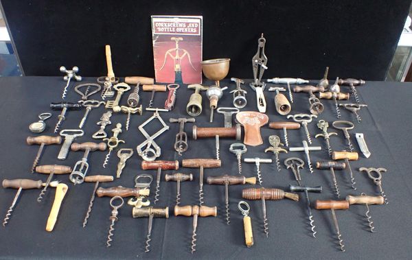 A COLLECTION OF CORKSCREWS AND OTHER BOTTLE OPENERS