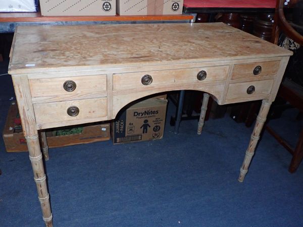 A REGENCY STRIPPED PINE DRESSING TABLE