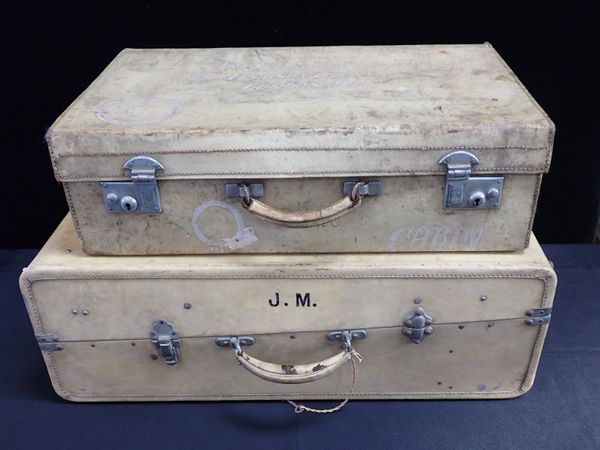 TWO VINTAGE VELLUM SUITCASES