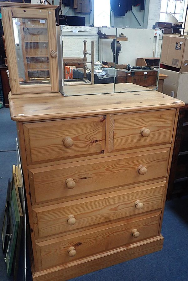A MODERN PINE CHEST OF DRAWERS