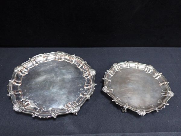 TWO SIMILAR SILVER-PLATED ON COPPER FOOTED WAITERS