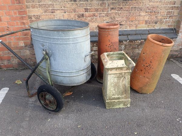 A GALVANISED WATER CARRIER