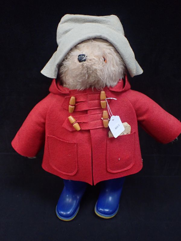 A VINTAGE PADDINGTON BEAR WITH RED DUFFEL COAT AND  BLUE WELLIES