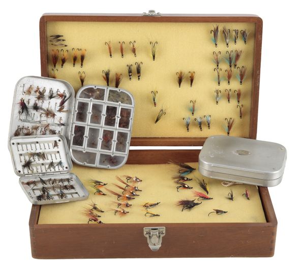 A LARGE WOODEN FLY BOX