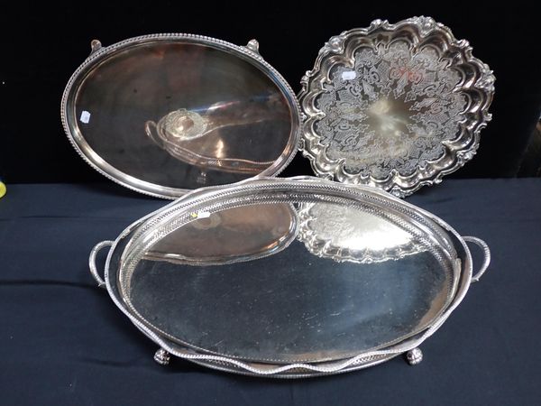 A LARGE SILVER-PLATED OVAL TRAY