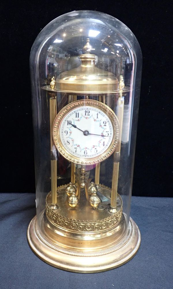 A 400 DAY TORSION CLOCK, WITH ENAMEL DIAL