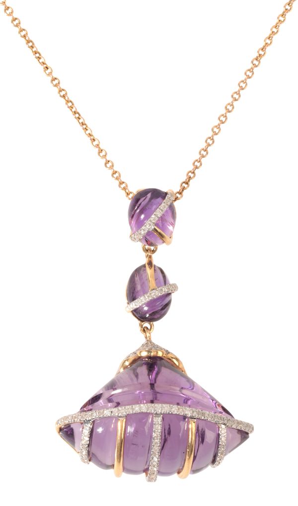 A CARVED AMETHYST AND DIAMOND PENDANT NECKLACE