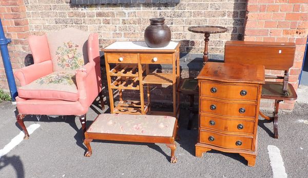 A SMALL YEW-WOOD CHEST OF DRAWERS