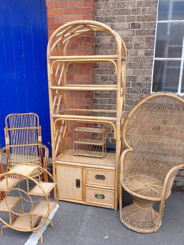 A RETRO BAMBOO DISPLAY STAND WITH ARCHED TOP
