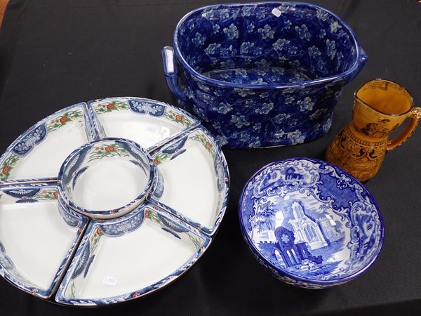 A REPRODUCTION BLUE AND WHITE FOOT BATH