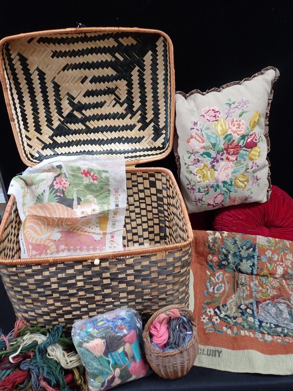 A WOVEN LIDDED BASKET