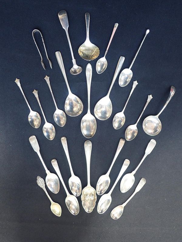 A GEORGE III WHITE METAL OLD ENGLISH FEATHER CADDY SPOON