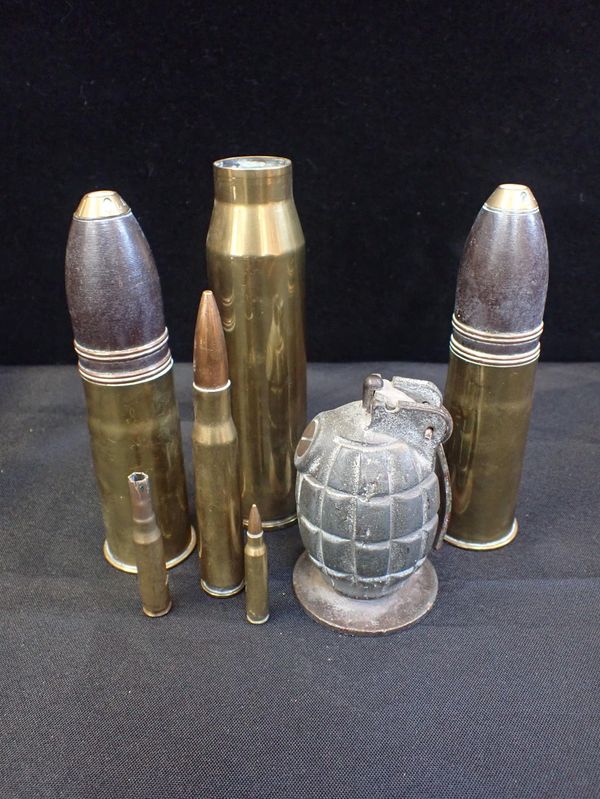 A PAIR OF WWI SHELL CASES, A HAND GRENADE