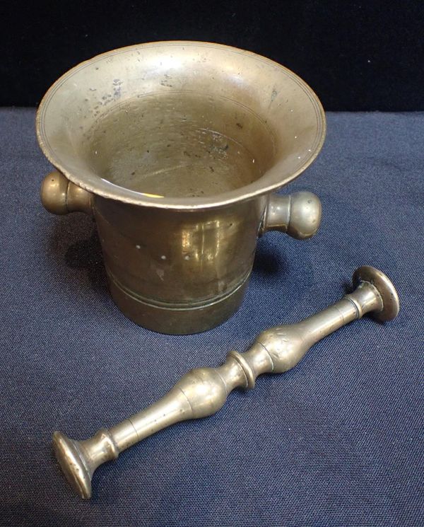 AN 18th CENTURY MORTAR AND PESTLE