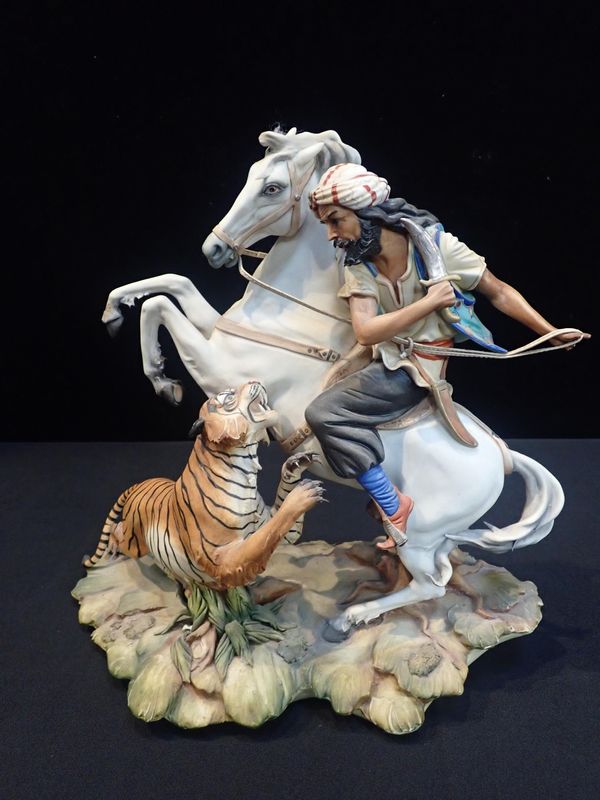 CAPODIMONTE FIGURE OF A HORSEMAN ATTACKED BY A TIGER