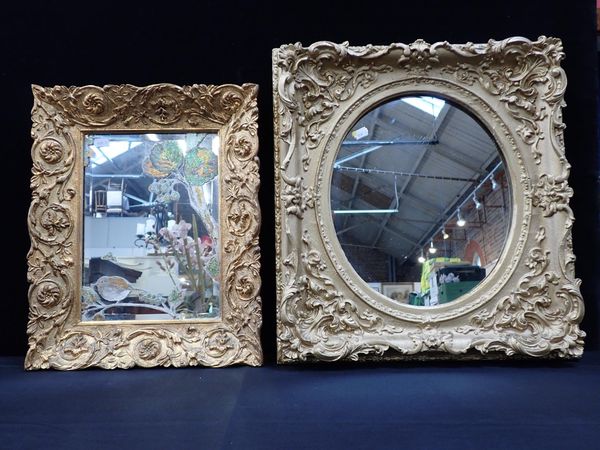 A MOULDED AND GILT FRAMED MIRROR