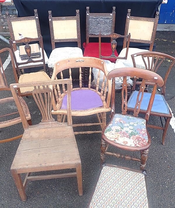 A SET OF FOUR OAK DINING CHAIRS