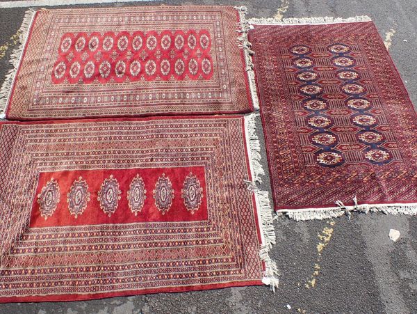THREE PAKISTAN BOKHARA RUGS