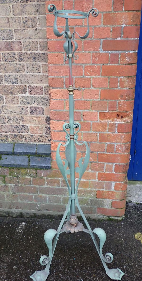 AN ART NOUVEAU BRASS AND IRON STANDARD LAMP BASE