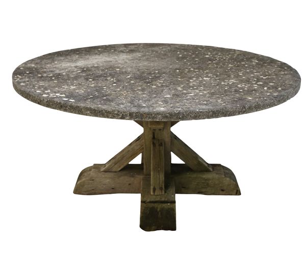 A LARGE RUSTIC CIRCULAR GARDEN TABLE