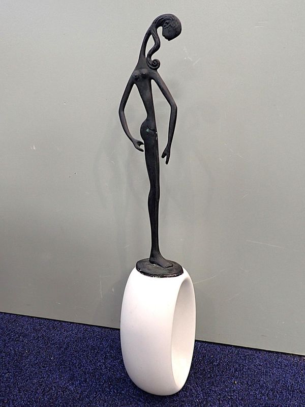 A MODERN  GREEK PATINATED STYLISED SCULPTURE OF A WOMAN