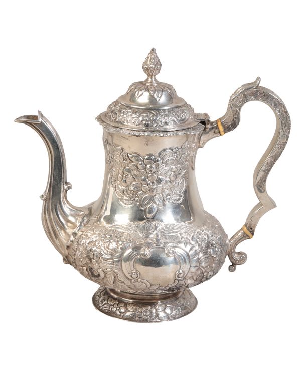 A GEORGE IV IRISH SILVER COFFEE POT