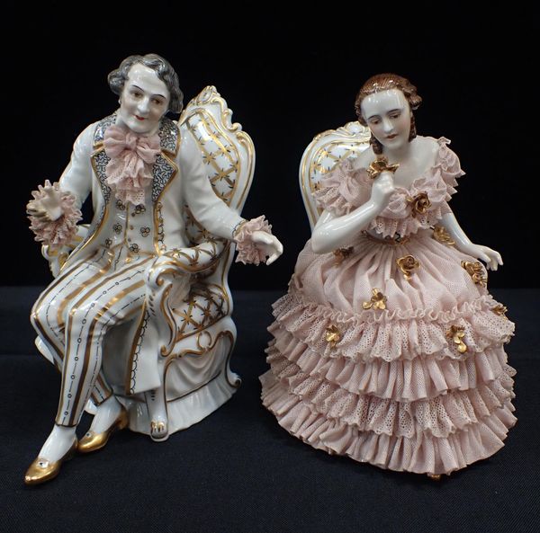 A PAIR OF VOLKSTEDT PORCELAIN FIGURES