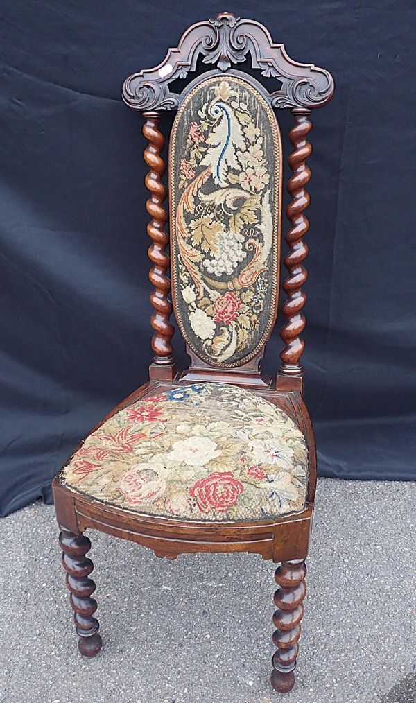 A VICTORIAN ROSEWOOD NURSING CHAIR