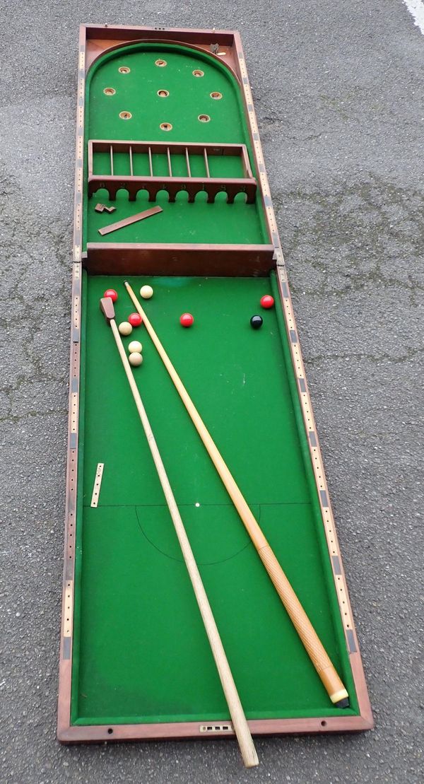 A MAHOGANY CASED BAR BILLIARDS GAME