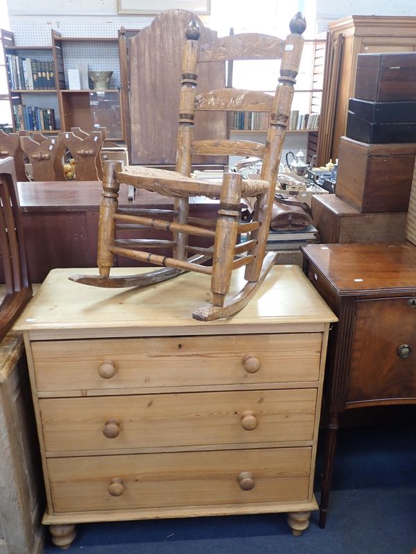 A LATE VICTORIAN PINE CHEST OF DRAWERS